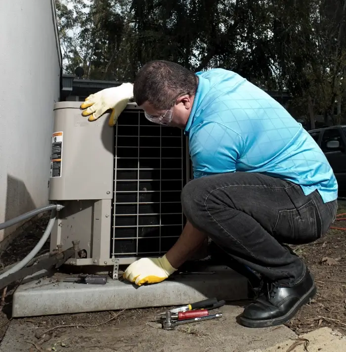 licensed-hvac-technician-performing-seasonal-tune-up-in-spotsylvania-va-1-1